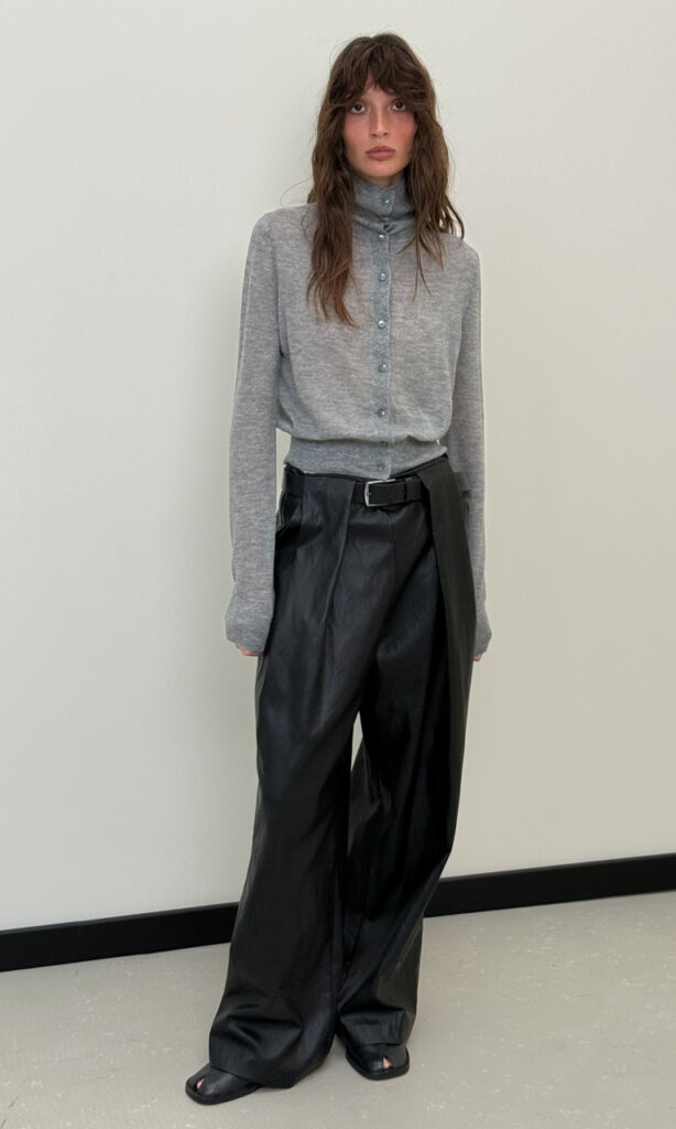 Belted tuck faux leather pants